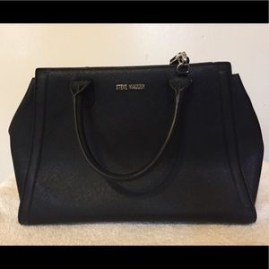 Steve Madden black hand bag with cross body strap.